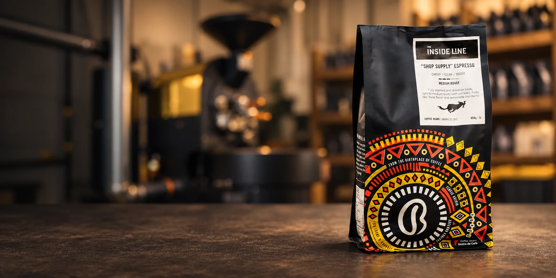 Custom-branded Bono coffee bag featuring The Inside Line label above Bono’s colourful Ethiopian-inspired design